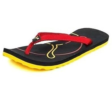 puma black and yellow slippers