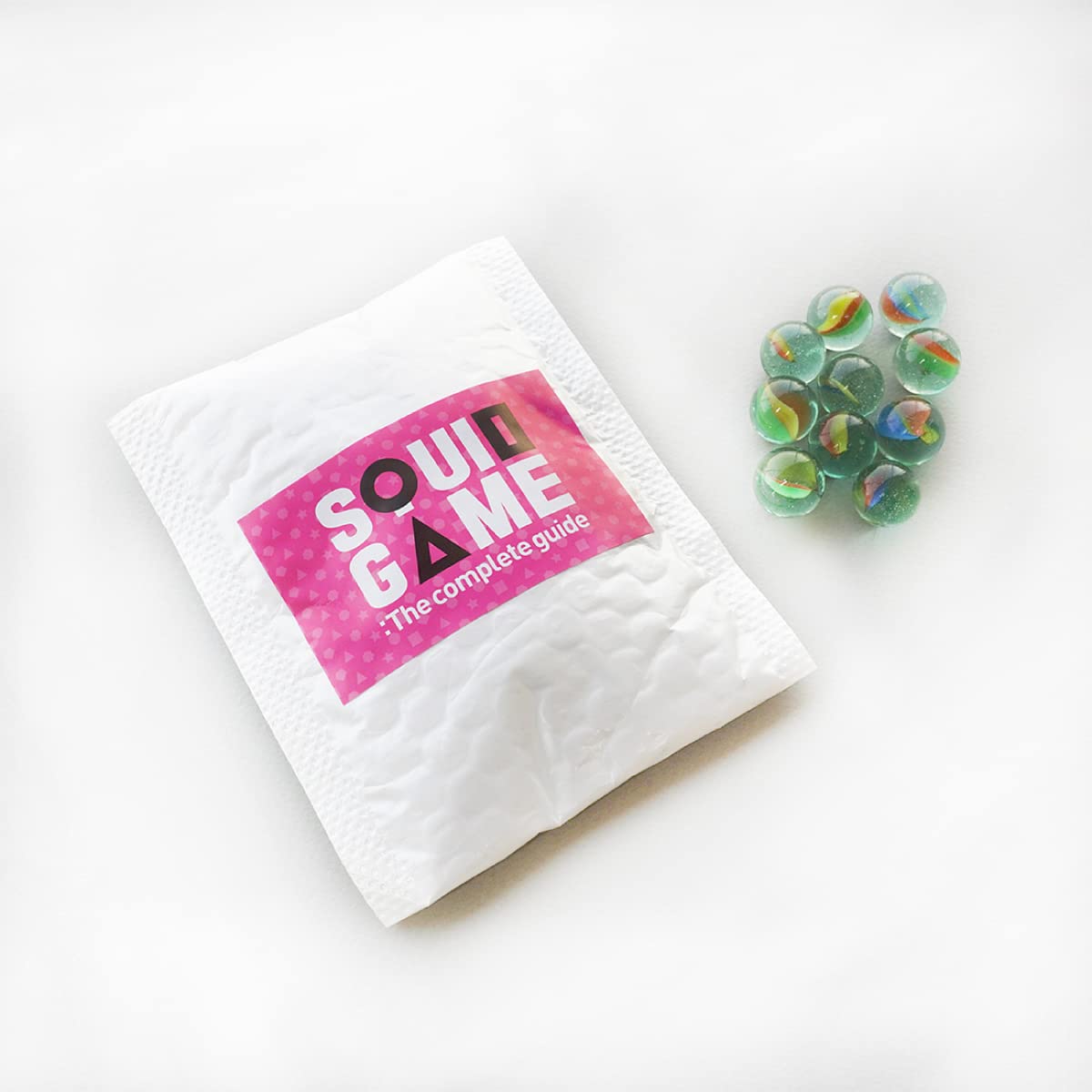 Squid Game Guide Kit (the Complete Guide Book+Dalgona Kit+2 Sticker Sheets+Ddakji Paper+10 Marbles+1 Box of Chalks) (English & Korean) 오징어 게임 설명서 키트