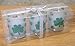 Shamrock Candle Holders - Set of 3 Frosted Votive Candle Holders with LED Candles Included - Glittery Green Shamrock Design