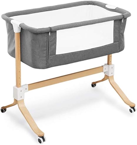 baby sleeping wooden bed