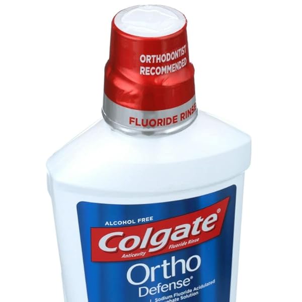COLGATE ORTHO DEFENSE PHOS-FLUR ANTICAVITY MOUTHWASH, ALCOHOL FREE MOUTHWASH FOR BRACES, MADE WITH FLUORIDE AND PHOSPHATE TO REDUCE WHITE SPOTS AND HELP PREVENT CAVITIES, MINT, 16.9 FL OZ BOTTLE