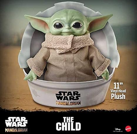 Amazon Com Coleccionista Star Wars The Mandalorian Baby Yoda Plush He May Look Like A Baby Yoda But This Lovable Creature Is Referred To The Child Home Kitchen