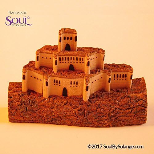 A Miniature Wooden Folding Castle that is cut from one small piece of tree branch. Done completely by hand using a handsaw.