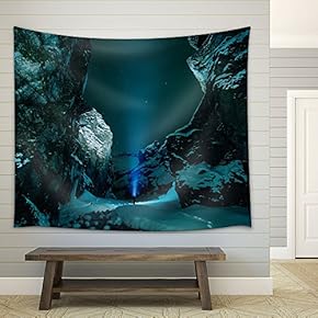 a Man in Exploration of Mountains with Snow Covered - Fabric Wall Tapestry Home Decor - 51x60 inches