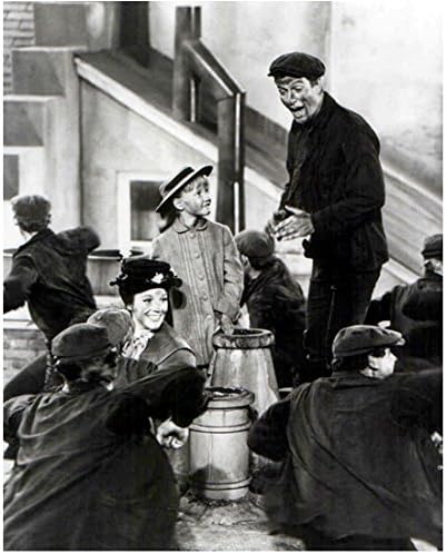 Mary Poppins (1964) 8 inch x10 inch photograph B&W Dick Van Dyke Standing & Singing Among Several Chimney Sweeps kn