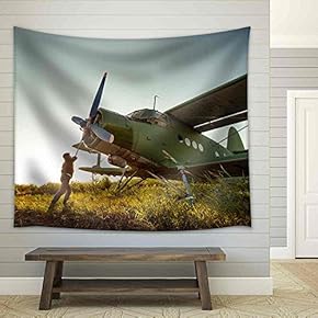 Pilot is Starting Engine of Vintage Plane Rural Background - Fabric Wall Tapestry Home Decor - 51x60 inches