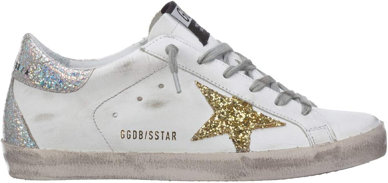 white shoes with gold stars