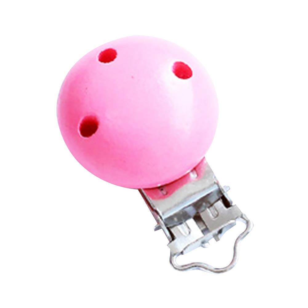 baby chewing on dummy