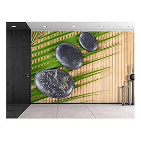 Rocks on a Palm Leaf Over a Bamboo Mat - Wall Mural, Removable Sticker, Home Decor - 66x96 inches