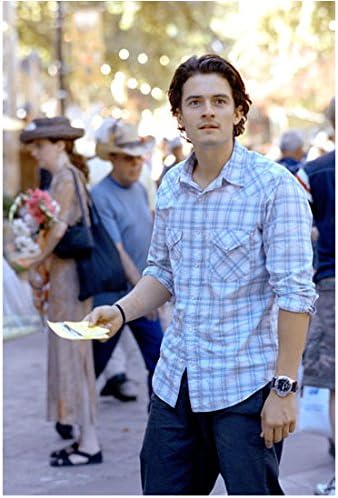 Orlando Bloom 8 Inch X 10 Inch Photo The Hobbit Pirates Of The Carribean Lord Of The Rings In Blue White Plaid Shirt Holding Papers In Right Hand Kn At Amazon S Entertainment Collectibles
