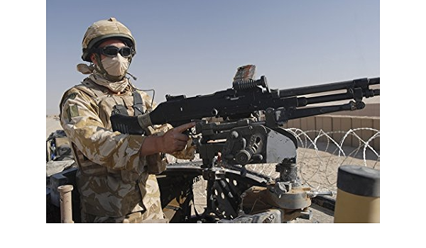 Amazon Com Posterazzi Pstachm A Soldier Of The British Army Mans A Machine Gun Mounted On Top Of A Land Rover Poster Print 17 X 11 Posters Prints