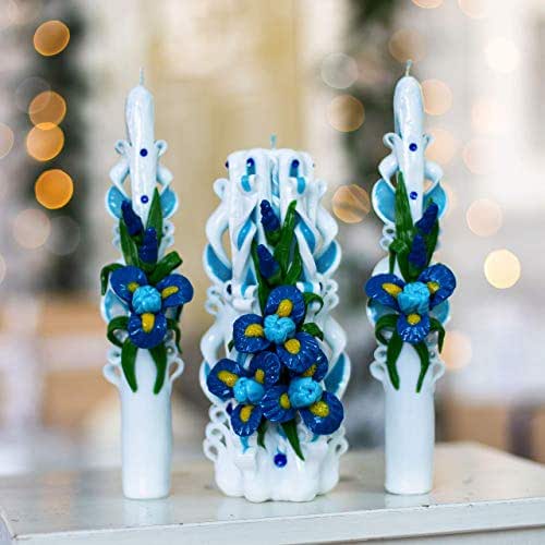 Carved candle set with blue irises for home decoration and