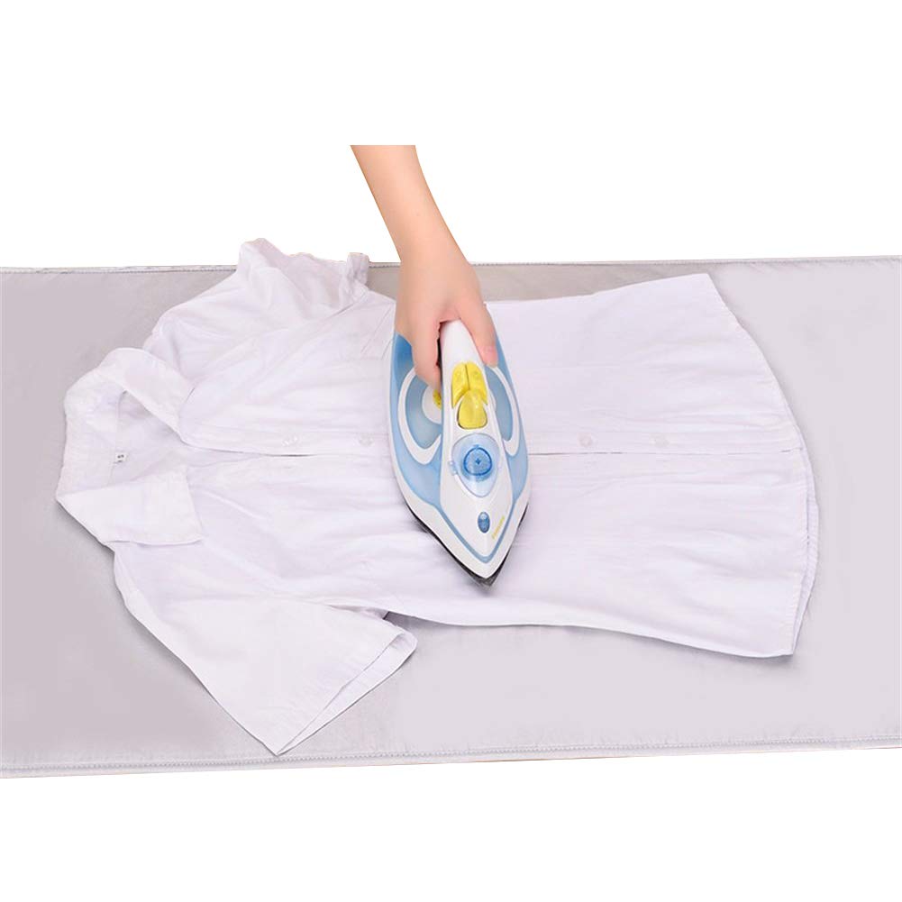 uso en la parte superior qees espesan alfombrilla de planchar Planchado