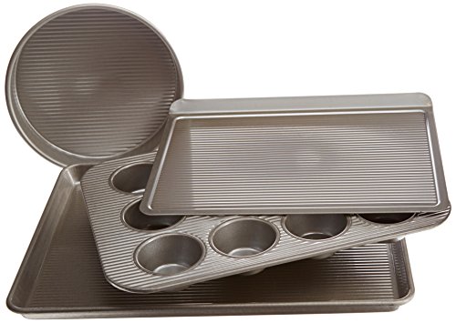 Click Here to See More Images USA Pan Bakeware Aluminized Steel 4 Piece Essential Baker Pan Set, 12 Cup Muffin Pan, Round Cake Pan, Cookie Sheet and Half Sheet