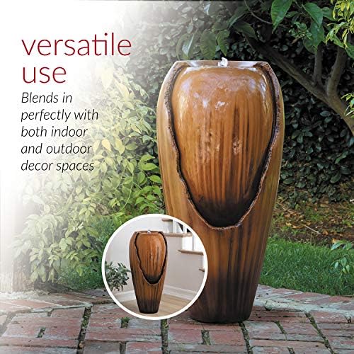 Outdoor tiered jar fountain with flowing water.