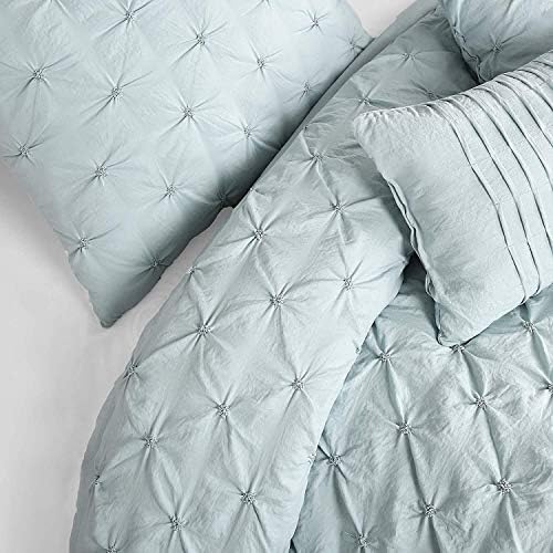 Queen size comforter set with matching pieces, featuring a value of $300.00 discounted to $98.64.