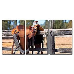 3 Piece Canvas Wall Art - a Western Style Saddle Siting Upon a Country Fence Beside a Riding Arena. - Modern Home Art Stretched and Framed Ready to Hang - 16"x24"x3 Panels
