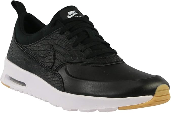 black nike thea trainers
