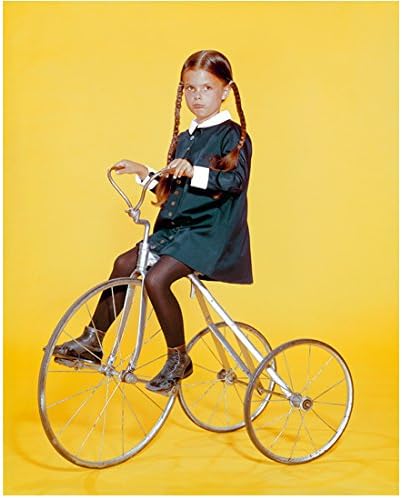 The Addams Family (Original) Lisa Loring as Wednesday Addams Riding Tricycle 8 x 10 Photo