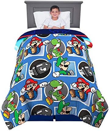 Mario-themed comforter bedding set on a bed.