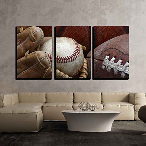 wall26 - 3 Piece Canvas Wall Art - Close Up Shot of Well Worn Baseball in Baseball Glove, Football and Basketball - Modern Home Decor Stretched and Framed Ready to Hang - 24