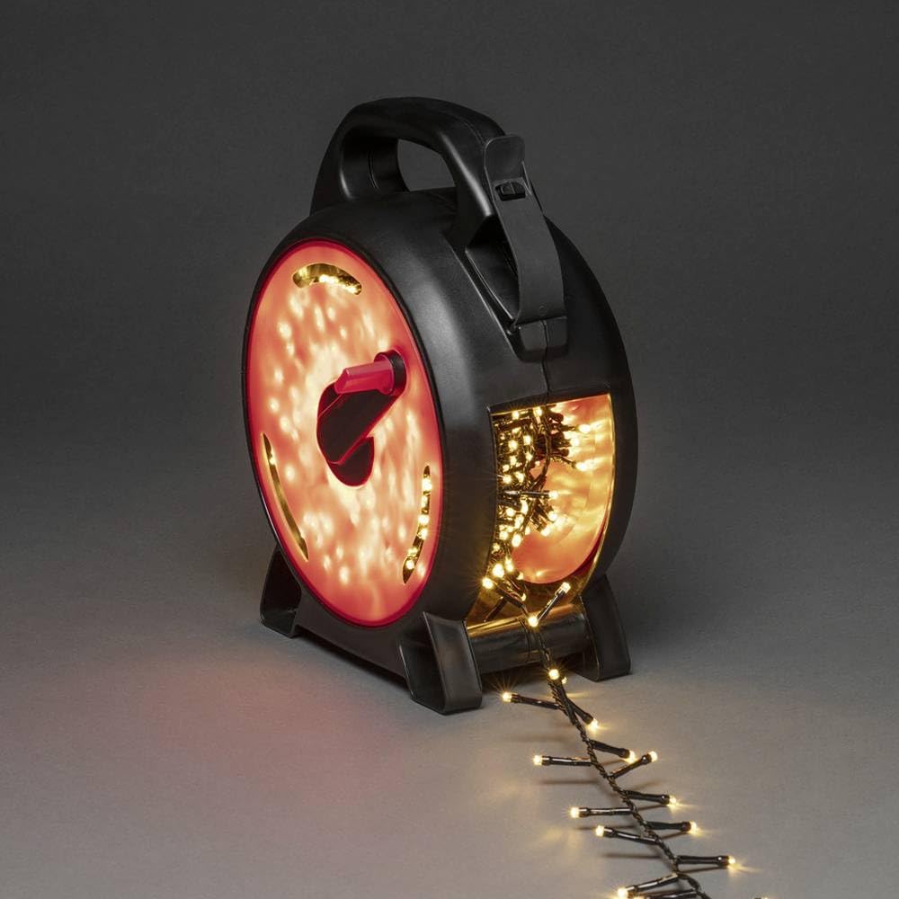 Konstsmide Micro LED Cable Reel Christmas Fairy Lights/Outdoor or Indoor (IP44) Plug in / 600 Amber White Diodes Cluster/Black Cable String Lights — image 1