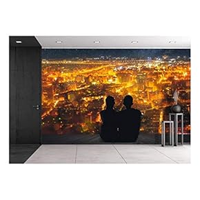 Silhouette of Young Asian Couple Sit on Wooden Ground Above The City Under Stars. - Removable Wall Mural | Self-Adhesive Large Wallpaper - 66x96 inches