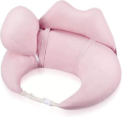 baby holding cushion