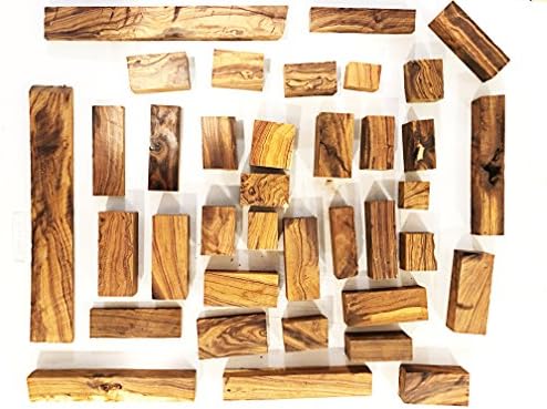 Exotic Ironwood blanks 15 POUND box. Random assortment of Beautifull ironwood cutt offs. Great for small projects, including intarsia, woodturning and more!!!