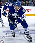 James van Riemsdyk Toronto Maple Leafs Autographed 16" x 20" Blue Uniform with Puck Photograph - Fanatics Authentic Certified