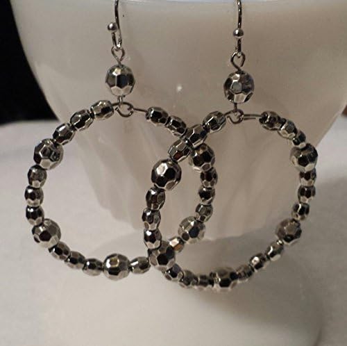 Hoop earrings. Faceted metalized acrylic beads on memory wire. 1 1/2 inch diameter. Very sparkly. Lightweight. French hook ear wires.