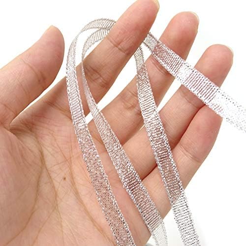 Silver sparkle ornament with intricate arts and crafts design, priced at $7.89.