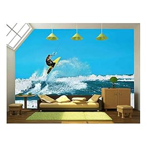 Recreational Water Sports Action. Healthy Man (Surfer) Kiteboarding (Kite Surfing) on Waves in Sea, Ocean - Removable Wall Mural | Self-Adhesive Large Wallpaper - 66x96 inches