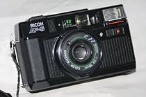 Ricoh Company Lty. Ricoh AF-5 35mm Film Camera Ricoh AF System w/ Ricoh 1:2.8 38mm Color Rikenon Lens w/ ISO 25, 64, 100, 200, 400, 1000 ASA 35mm Film Camera (Black Color)