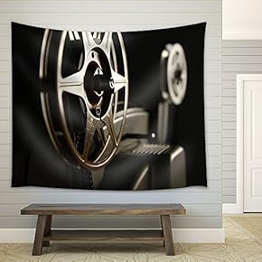 Close-up of The Film reels on a Vintage 8mm Film Projector in a Dark Room - Fabric Wall Tapestry Home Decor - 51x60 inches