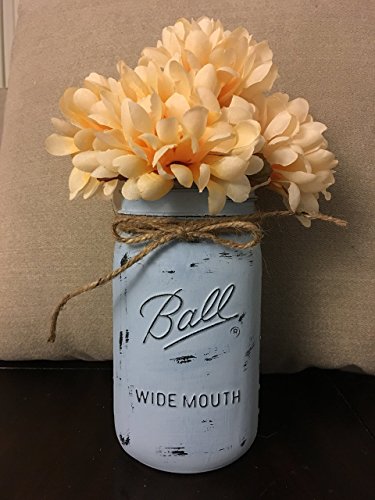Distressed light blue chalk painted wide mouth mason jar centerpi…