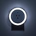 LED Concepts Plug-In LED Night Light with Outlet - Dusk to Dawn Round Sensor Light – Built-In Power Outlet – Great for Bedroom, Bathroom, Hallway, Stairways, or Dark Room, On / Off / Auto modes