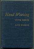 Hand weaving with reeds and fibers, by 