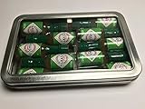 Miniature Tabasco Gift Tin. Ten 1/8 Ounce Mini Bottles of Hard to Find Green Jalapeno Tabasco Pepper Sauce in a Hinged Tin with a Clear See Through Top.