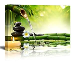 Rocks and Flowers Over Bamboo Branches on a...