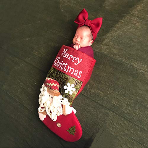 baby in christmas stocking