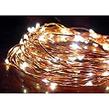Norsis Fairy Lights - Flexible Copper Wire Starry String Lights - 100 Miniature LED Lights, Extra Long Wire - Warm White Light - Indoor/Outdoor - Interior Decor, Wedding, Craft and DIY