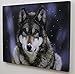 BANBERRY DESIGNS Gray Wolf Print - Wolf LED Lighted Canvas Picture - Wildlife Home Decor - Lone Grey Wolf Staring in a Snowy Winter Forest Scene - Hidden Lights for Glowing Effect - 16x12 Inch