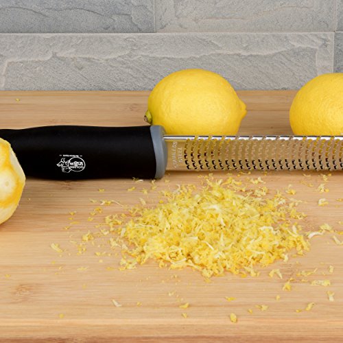 Stainless Steel Citrus Zester & Hand Safe Guard – Lemon, Orange & Lime Grater With Silicone Handle, Cover & A Finger Protector – Grate Cheese, Chocolate, Ginger, Garlic, Coconut, Onions & Potatoes