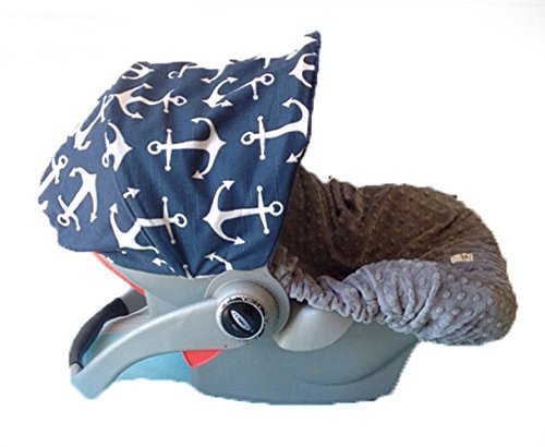 Baby Car seat Cover, Canopy in Navy White Anchors. Seat in grey silver
minky. FREE strap covers included Baby Car seat Cover, Canopy in Navy White Anchors. Seat in grey silver
minky. FREE strap covers included
