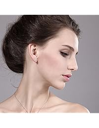 Charles y Colvard 4 mm VG Moissanite 0,50 quilates 14 K Amarillo Oro fricción Back Ronda 4 Prong Tuerca (0,44 quilates Moissanite, Si2   100% Eye Clean), color blanco