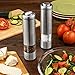 Pro Kitchen Life Battery Operated Salt and Pepper Grinder Set - Pack of 2 Mills - Durable Stainless Steel with Holder Tray - Adjustable Ceramic Coarseness with LED Light and Caps at Bottom