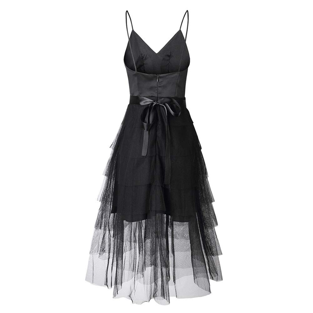 Vestido de noche con tirantes. Falda con volantes en capas. 