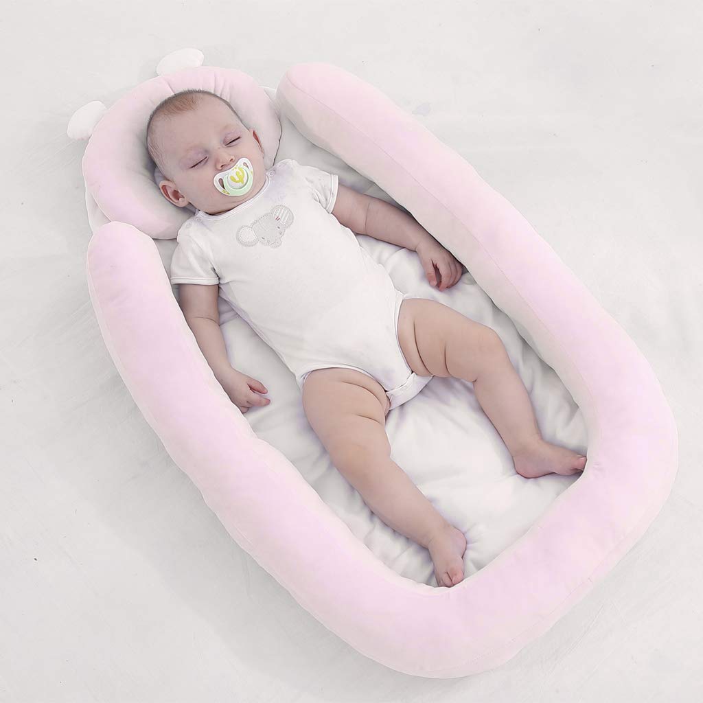 baby sleeping on soft mattress