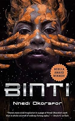 [Image shows the front cover design of Binti. The image is of a person's head with a red substance on their face and hair. Two hands touch the head on the left and right. Beneath the face are the words 'Binti' and 'Nnedi Okorafor.]